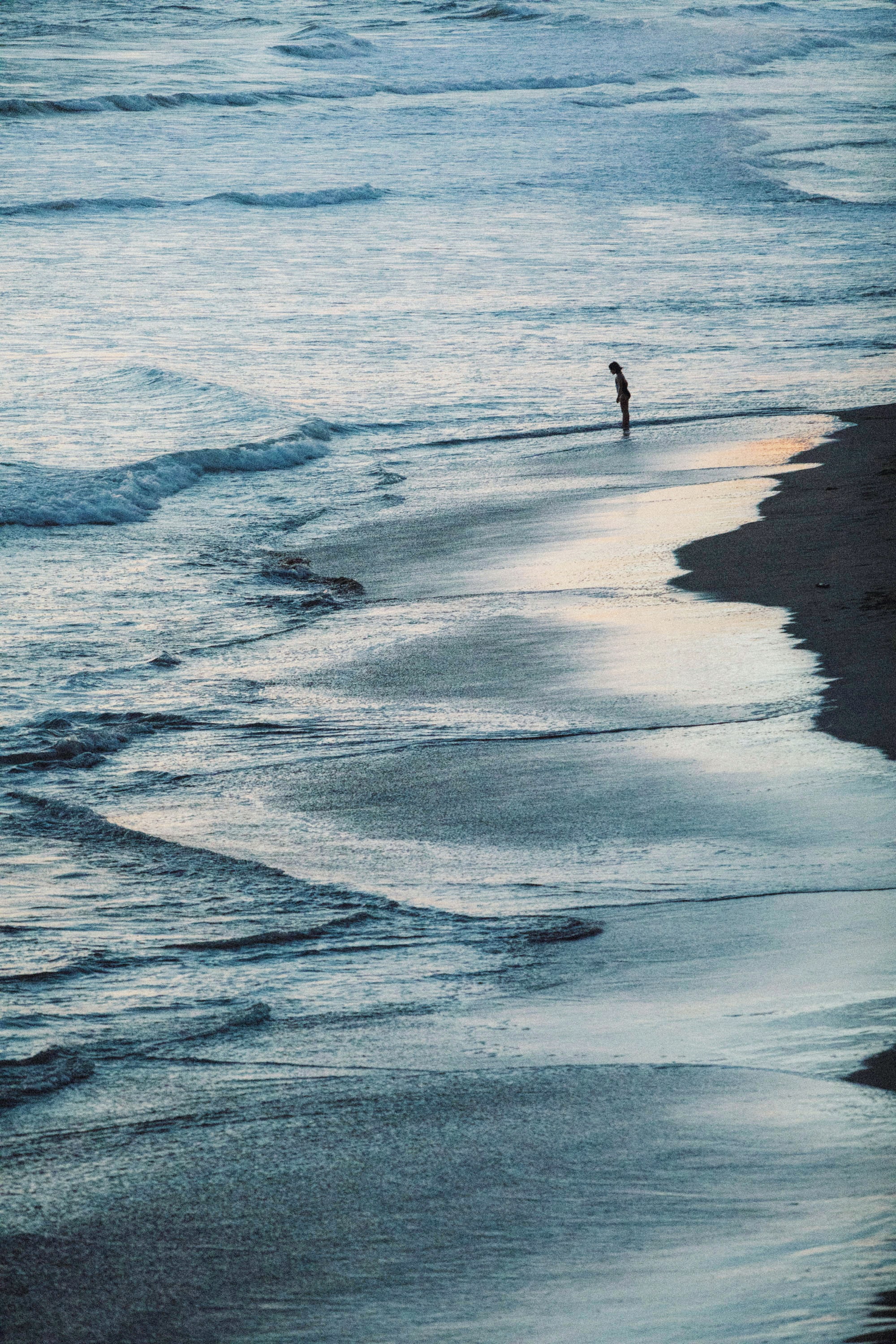 GIRL ON BEACH AT DUSK (HB) Owen Tozer Photography