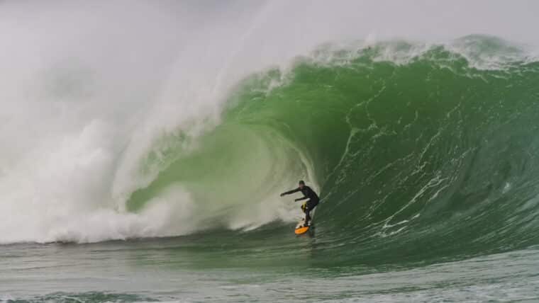Taz Knight drops into a huge wave in Ireland Image:CLEM MCINERNEY